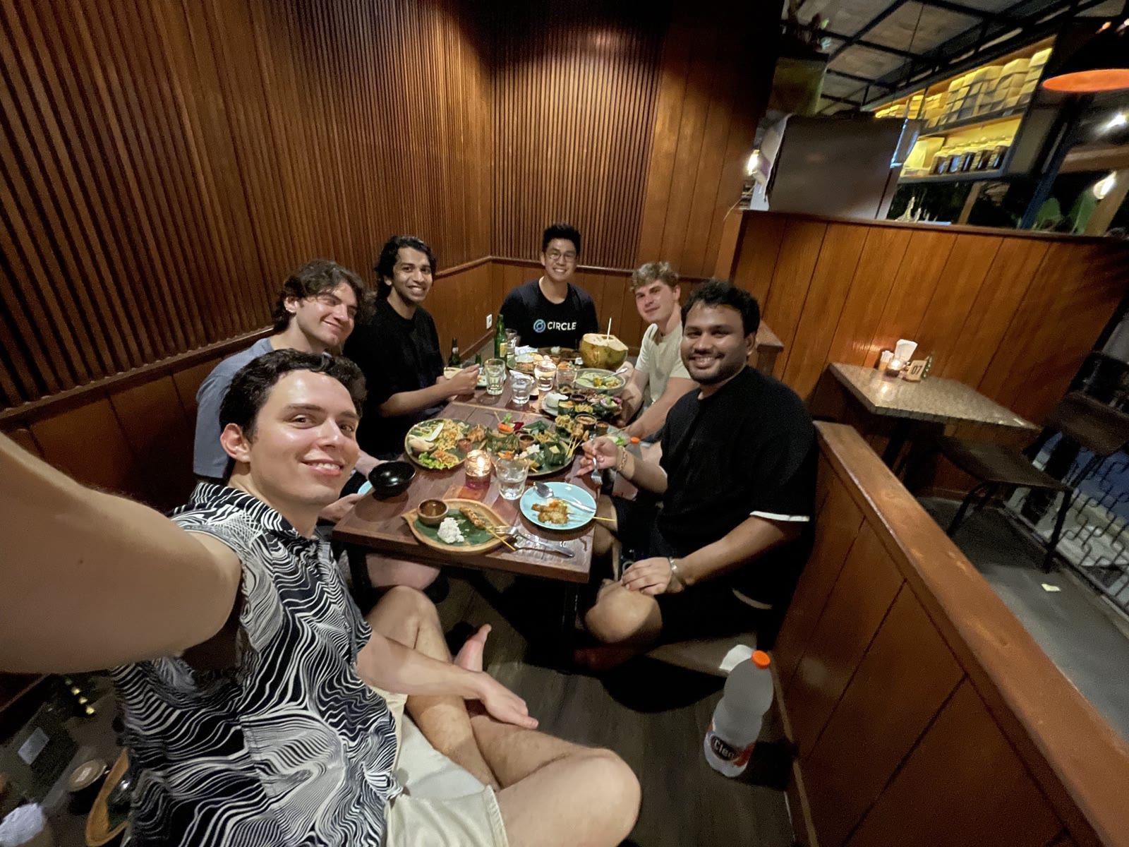 Selfie over a table of shared plates