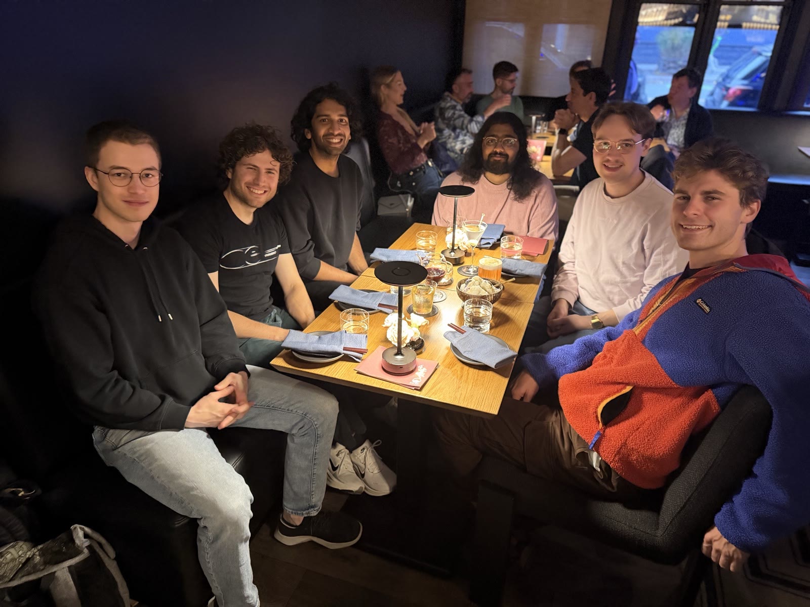 The team at a long dinner table